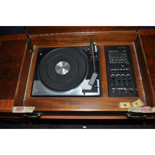 81 - A DYNATRON RG1010 RADIOGRAM, with a Garrard SP25 mark 4 turntable and a SRX20 amplifier (PAT pass an... 