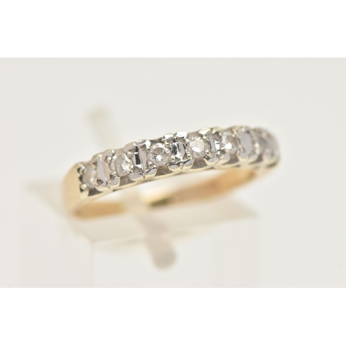 403 - A 9CT GOLD DIAMOND HALF ETERNITY RING, set with a row of seven small round brilliant cut diamonds, e... 