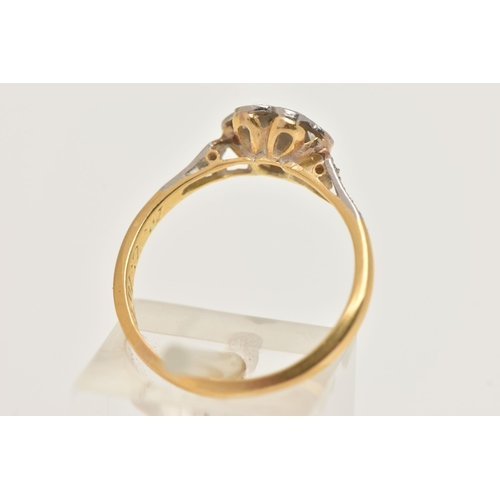 405 - A YELLOW METAL DIAMOND DAISY RING, flower head set with seven small single cut diamonds, with single... 