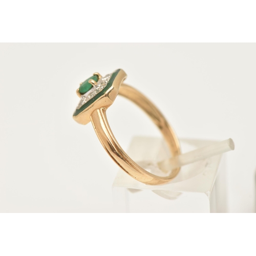 407 - A 14CT GOLD EMERALD AND DIAMOND RING, designed with a central oval cut emerald, four claw set within... 