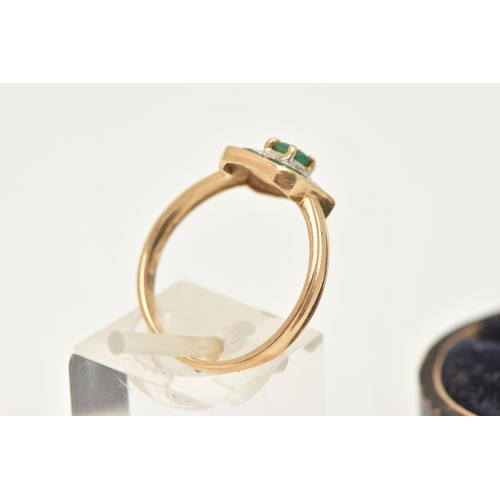 407 - A 14CT GOLD EMERALD AND DIAMOND RING, designed with a central oval cut emerald, four claw set within... 