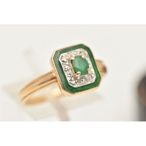 407 - A 14CT GOLD EMERALD AND DIAMOND RING, designed with a central oval cut emerald, four claw set within... 