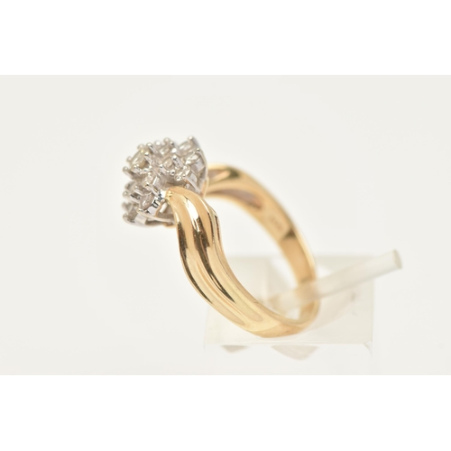 410 - A YELLOW METAL DIAMOND CLUSTER RING, tiered flower cluster of round brilliant cut diamonds, each cla... 