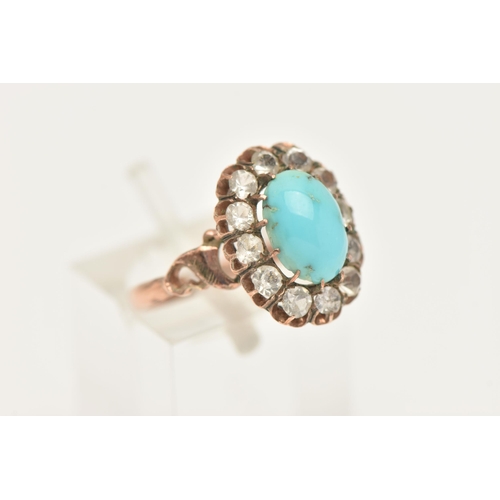 412 - A ROSE METAL TURQUOISE CLUSTER RING, of an oval form, set with a central oval cut turquoise, claw se... 