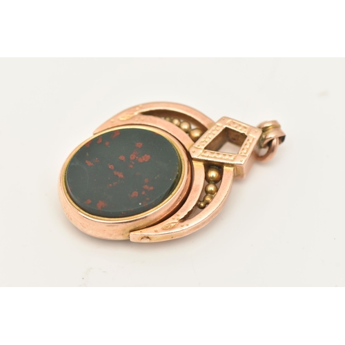 413 - A ROSE METAL SWIVEL FOB, of an oval form, set with a bloodstone and sardonyx polished inlay, collet ... 