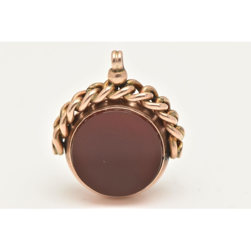 414 - A 9CT GOLD SWIVEL FOB, of a circular form, set with a polished carnelian and bloodstone inlay, hallm... 