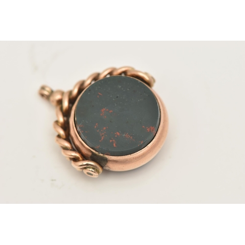 414 - A 9CT GOLD SWIVEL FOB, of a circular form, set with a polished carnelian and bloodstone inlay, hallm... 