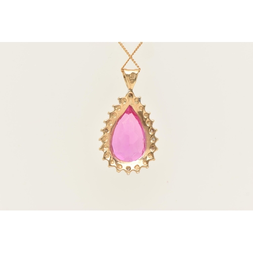 418 - A 9CT GOLD GEM SET PENDANT WITH CHAIN, the pendant of a pear drop shape with a central pear cut pink... 