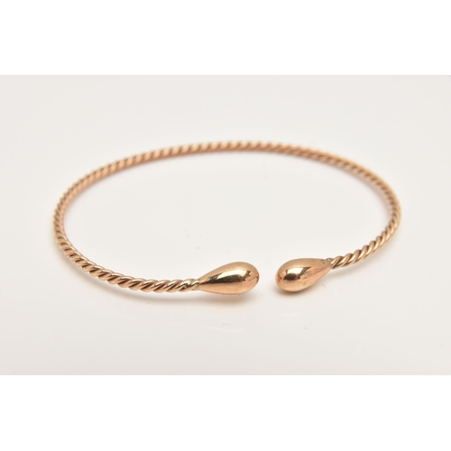 423 - A 9CT GOLD TWIST TORQUE BANGLE, hallmarked 9ct London, approximate internal diameter 65mm, polished ... 