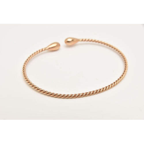 423 - A 9CT GOLD TWIST TORQUE BANGLE, hallmarked 9ct London, approximate internal diameter 65mm, polished ... 