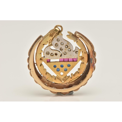 425 - AN 18CT GOLD GEM SET PENDANT, AF of a circular form, depicting a flame set with single cut diamonds,... 