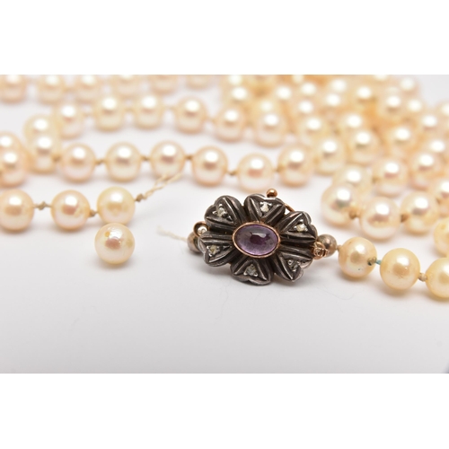 426 - A SINGLE STRAND OF CULTURED PEARLS, AF, cream pearls with a pink hue, each measuring approximately 6... 