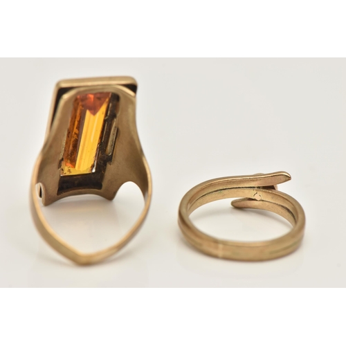 428 - TWO YELLOW METAL RINGS, the first AF set with a rectangular cut orange stone assessed as synthetic s... 