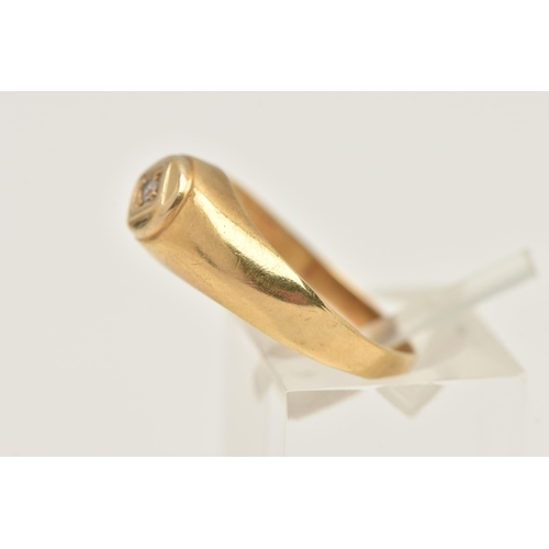 430 - A YELLOW METAL DIAMOND SINGLE STONE RING, set with a small single cut diamond, to a polished band, s... 