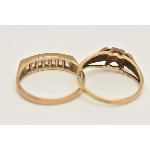 433 - TWO RINGS, the first a yellow metal ring set with a small single cut diamond in a white metal mount ... 