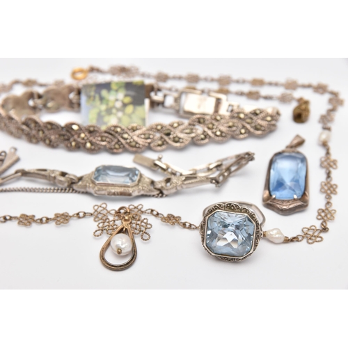 442 - A SMALL ASSORTMENT OF JEWELLERY, to include a light blue paste set pendant, stamped 835, a white met... 