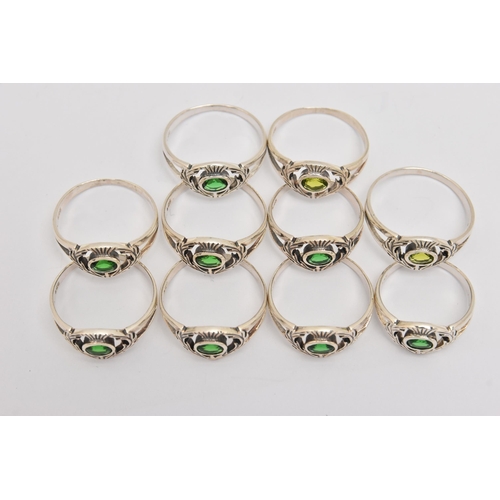 448 - TEN WHITE METAL GEM SET THISTLE RINGS, all of the same design, set with green stones, each stamped 9... 