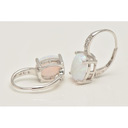 452 - A PAIR OF WHITE METAL SYNTHETIC OPAL AND CUBIC ZIRCONIA SET EARRINGS, set with an oval synthetic opa... 