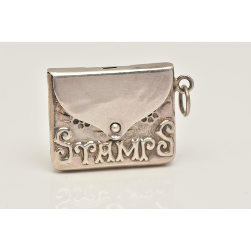 453 - A WHITE METAL STAMP HOLDER, in the form of an envelope, inscribed 'Stamps', fitted with a jump ring ... 