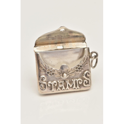 453 - A WHITE METAL STAMP HOLDER, in the form of an envelope, inscribed 'Stamps', fitted with a jump ring ... 