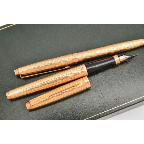 454 - A CASED 'PARKER' PRESIDENTIAL FOUNTAIN AND BALL POINT PEN SET, both stamped with French 18ct gold co... 