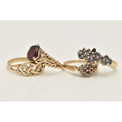 458 - FOUR 9CT GOLD RINGS, the first a Celtic knot design ring, together with three gem set rings, each ha... 