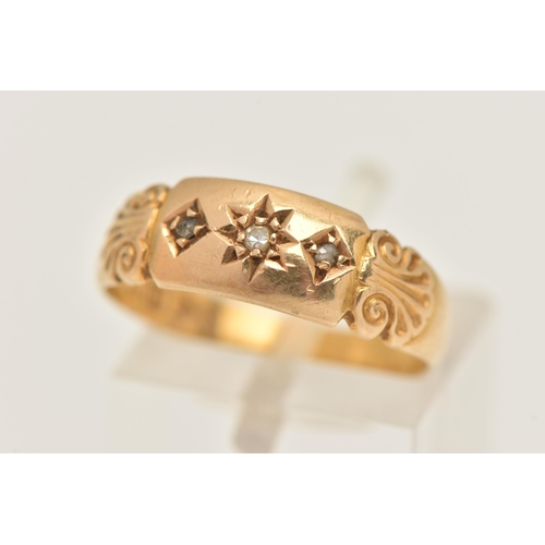 460 - AN 18CT GOLD RING, a yellow gold band ring set with three single cut diamonds and shell detail to th... 