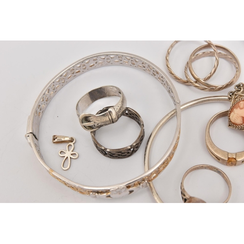 474 - A SMALL ASSORTMENT OF JEWELLERY, to include an open work hinged bangle stamped 925, a white metal ba... 