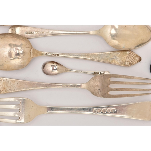 509 - A SELECTION OF SILVER CUTLERY, various pieces to include eight teaspoons, three forks, a sauce spoon... 