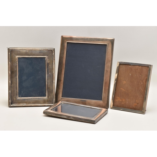 541 - FOUR SILVER PHOTO FRAMES, each of a rectangular form, three with a polished finish the other with a ... 