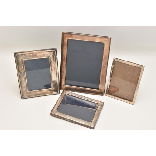 541 - FOUR SILVER PHOTO FRAMES, each of a rectangular form, three with a polished finish the other with a ... 