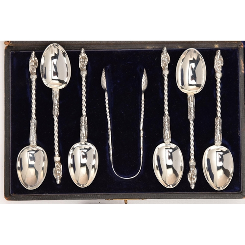 545 - THREE CASED SETS OF SILVER CUTLERY, to include a cased set of six apostle top teaspoons with shell b... 