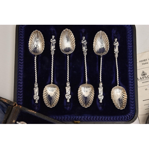 545 - THREE CASED SETS OF SILVER CUTLERY, to include a cased set of six apostle top teaspoons with shell b... 