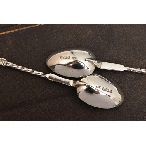 545 - THREE CASED SETS OF SILVER CUTLERY, to include a cased set of six apostle top teaspoons with shell b... 