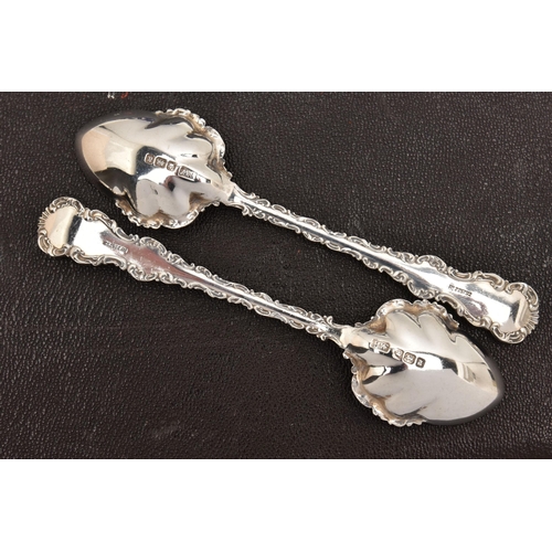 545 - THREE CASED SETS OF SILVER CUTLERY, to include a cased set of six apostle top teaspoons with shell b... 