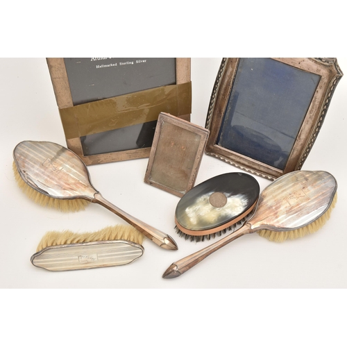 546 - AN ASSORTMENT OF SILVER ITEMS, to include a three piece brush set with engine turned pattern detail,... 