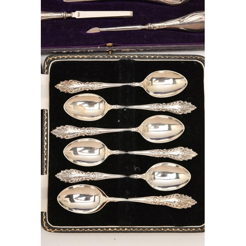 549 - AN ASSORTMENT OF CASED SILVER ITEMS, to include a cased silver travel manicure set, hallmarked 'W J ... 