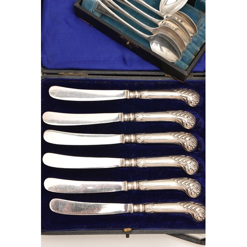 549 - AN ASSORTMENT OF CASED SILVER ITEMS, to include a cased silver travel manicure set, hallmarked 'W J ... 