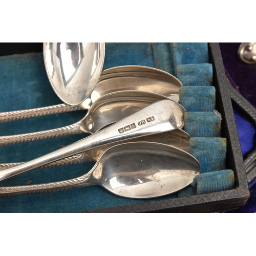 549 - AN ASSORTMENT OF CASED SILVER ITEMS, to include a cased silver travel manicure set, hallmarked 'W J ... 