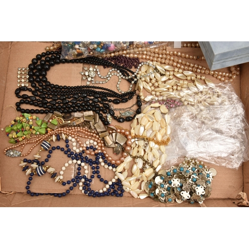 554 - A BOX OF ASSORTED COSTUME JEWELLERY, to include a selection of beaded necklaces, brooches, earrings,... 