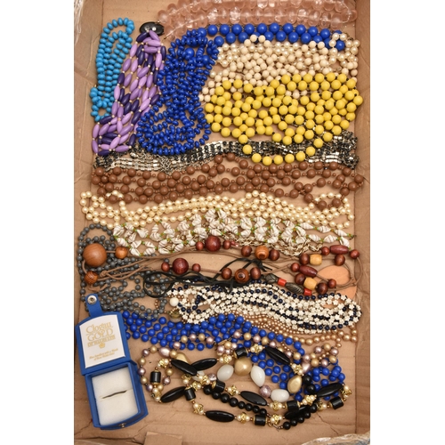 554 - A BOX OF ASSORTED COSTUME JEWELLERY, to include a selection of beaded necklaces, brooches, earrings,... 