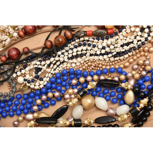 554 - A BOX OF ASSORTED COSTUME JEWELLERY, to include a selection of beaded necklaces, brooches, earrings,... 