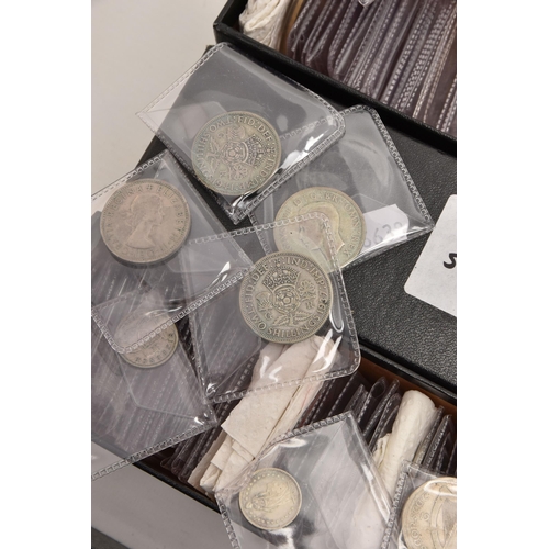 569 - A LARGE PLASTIC TUB OF WORLD COINS, to include an undated 20p coin minted in error, a small box cont... 