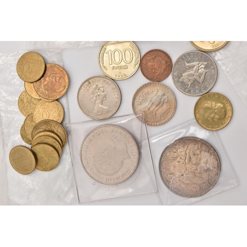 572 - A PLASTIC POT OF MIXED COINS TO INCLUDE A SILVER HINDU GOOD LUCK TOKEN etc