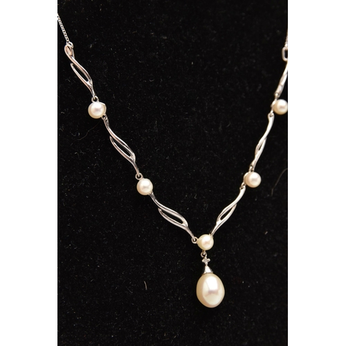 579 - A CULTURED PEARL NECKLACE, six cultured pearls set in a white metal festoon style necklace, suspende... 