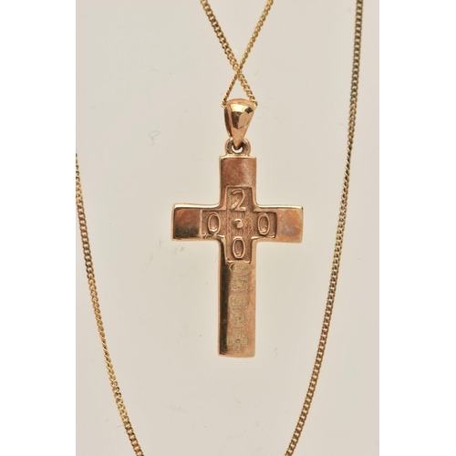 580 - A 9CT GOLD CROSS NECKLACE, a yellow gold cross pendant, with decorative 9ct gold Birmingham 2000 hal... 