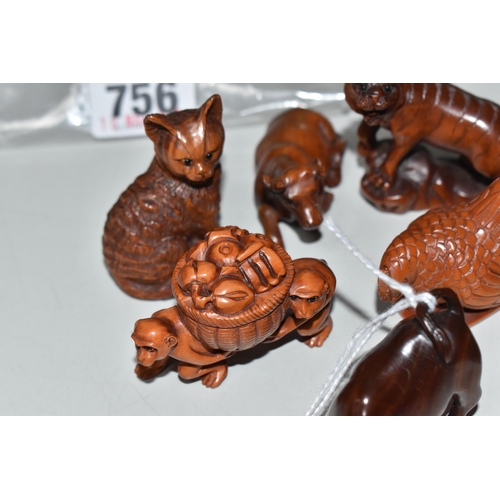 756 - EIGHT WOODEN NETSUKE, in the forms of various creatures, comprising an ox (tiny faults on its back),... 