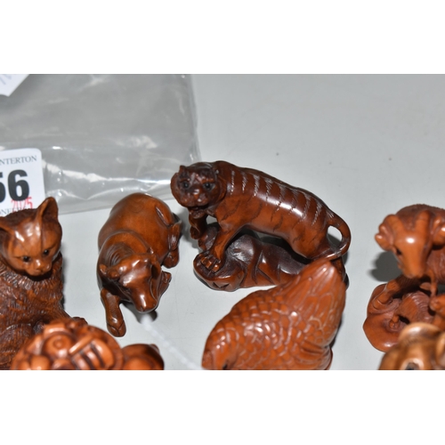 756 - EIGHT WOODEN NETSUKE, in the forms of various creatures, comprising an ox (tiny faults on its back),... 