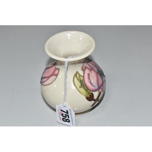 758 - A MOORCROFT POTTERY MAGNOLIA VASE, of wide necked baluster form, tube-lined with pink magnolia bloom... 