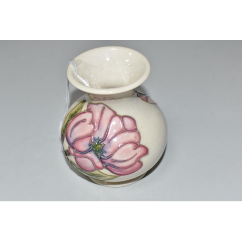 758 - A MOORCROFT POTTERY MAGNOLIA VASE, of wide necked baluster form, tube-lined with pink magnolia bloom... 